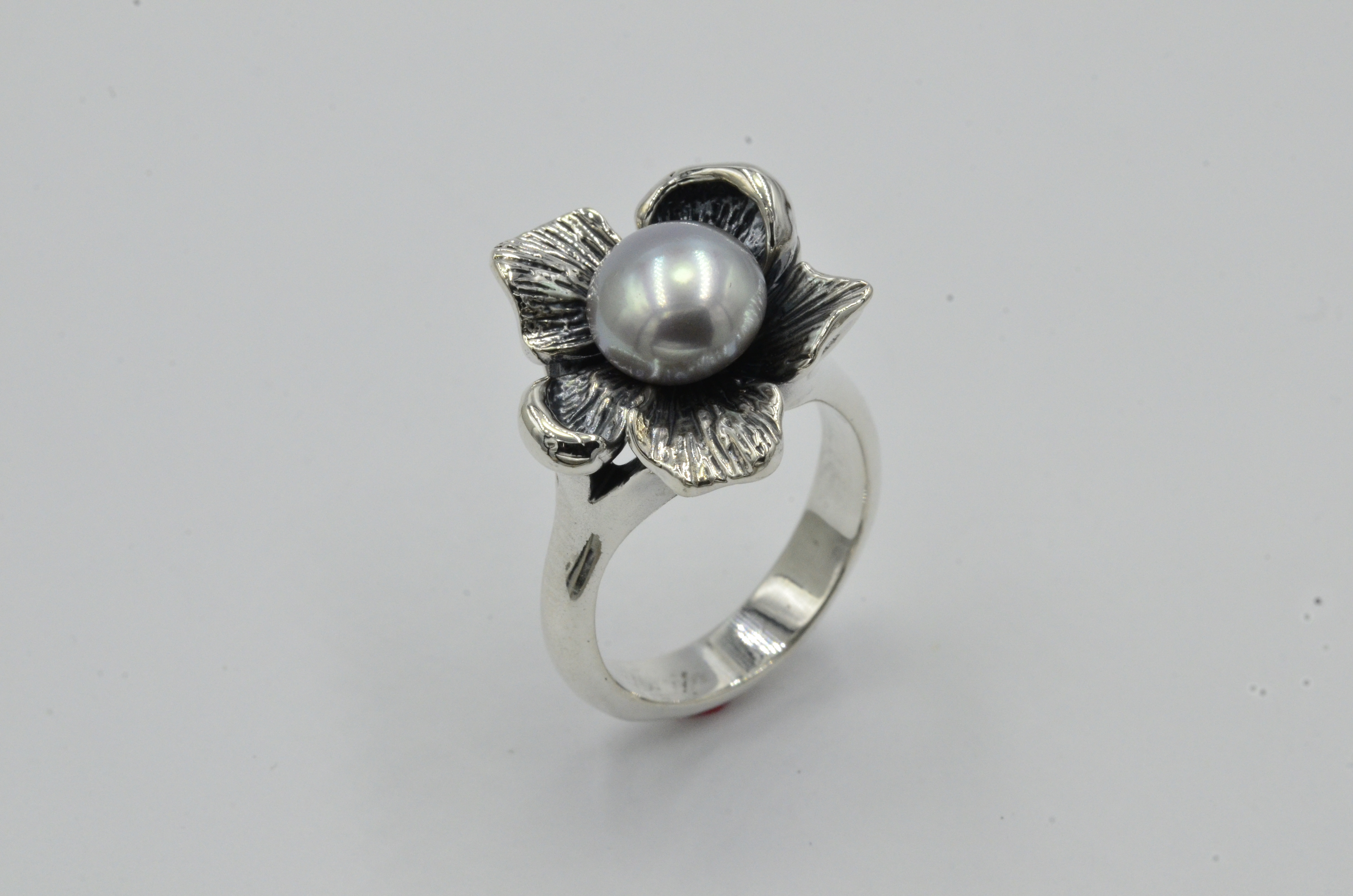 Hand crafted abstract Flower ring. Very popular gift that girlfriends chip in on when one of the girls has a special birthday.